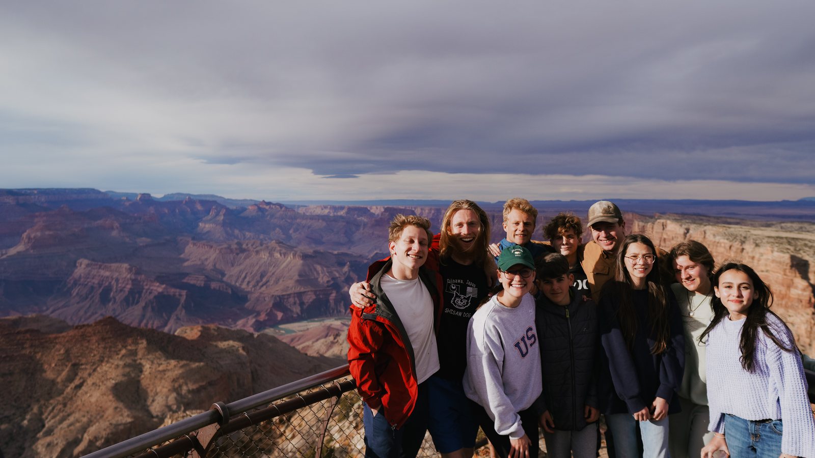 A group looking out over the Grand Canyon